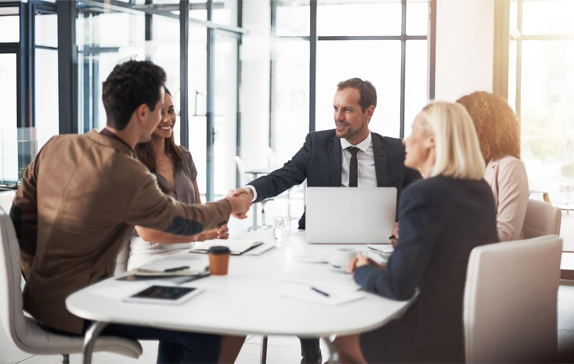 Business people handshake and meeting for b2b deal partnership or teamwork in office conference