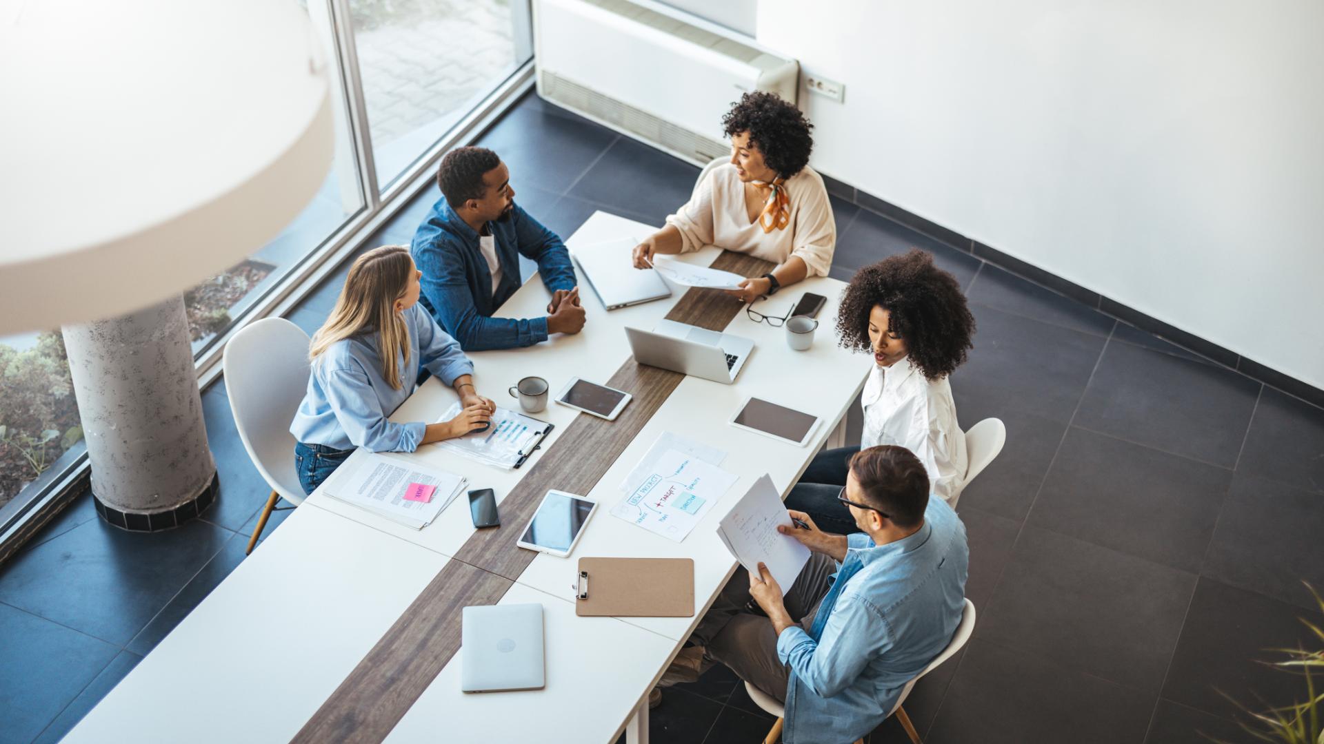 Diverse Team Collaborating During a Productive Meeting