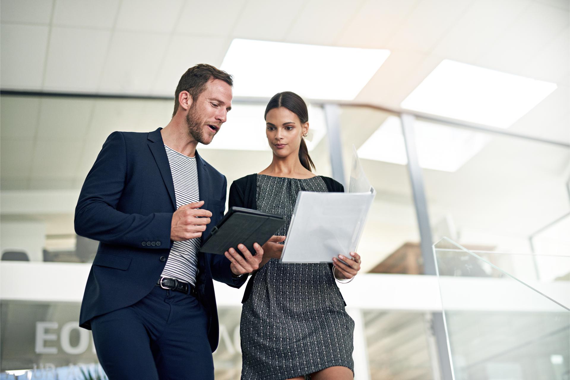 Talking assistant or business people on tablet walking in office for planning project review or company feedback