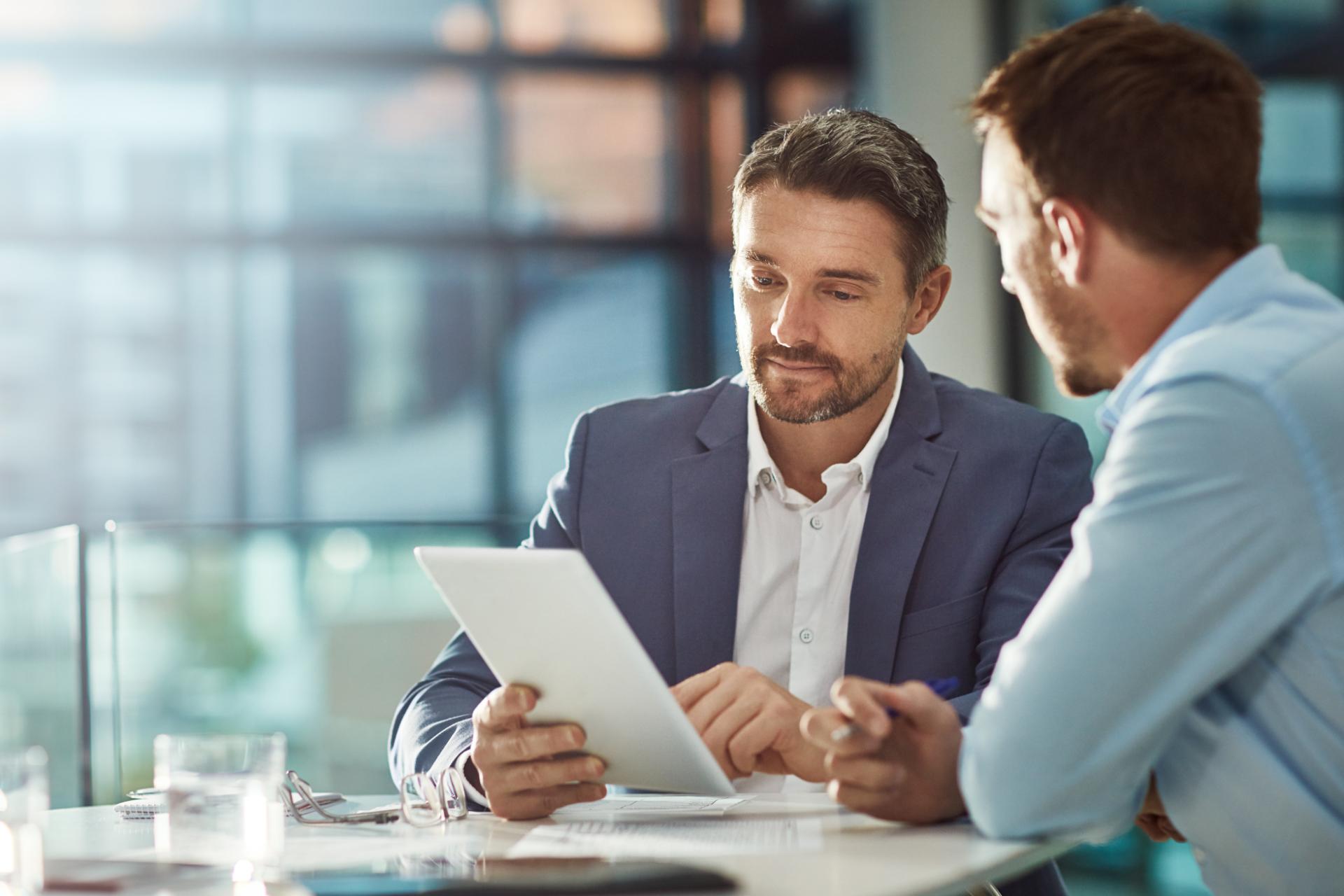 Teamwork meeting tablet and business people in office workplace