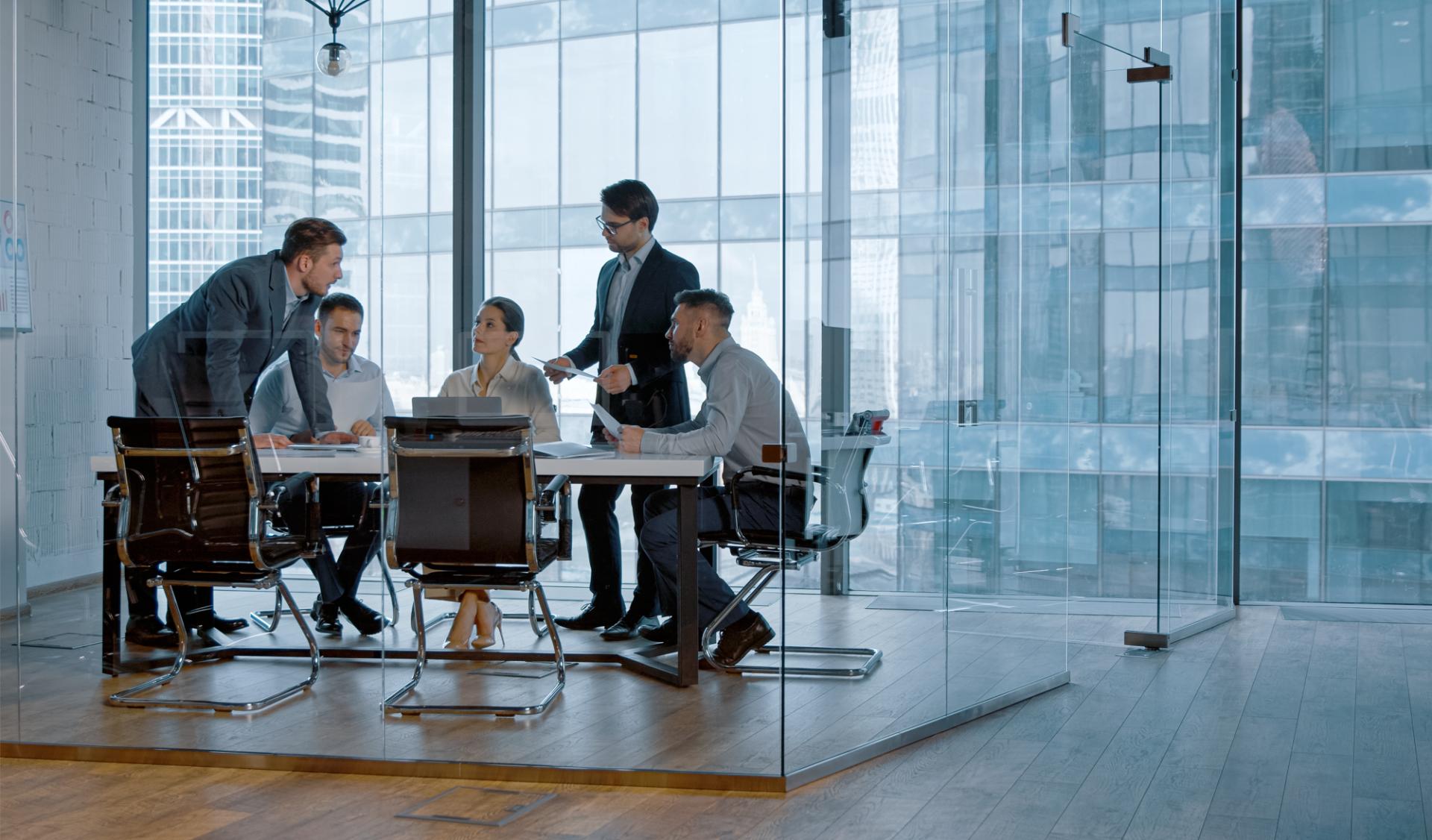 Teamwork young business people discussing holding a presentation in modern office