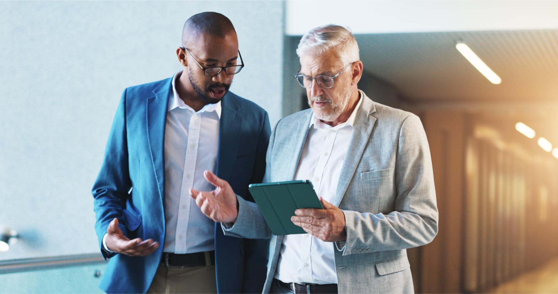 Business people or walking with tablet for planning of proposal feedback performance evaluation or briefing