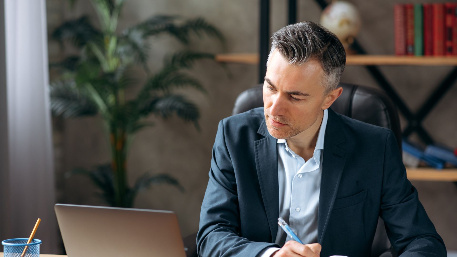 business leader reviewing performance metrics