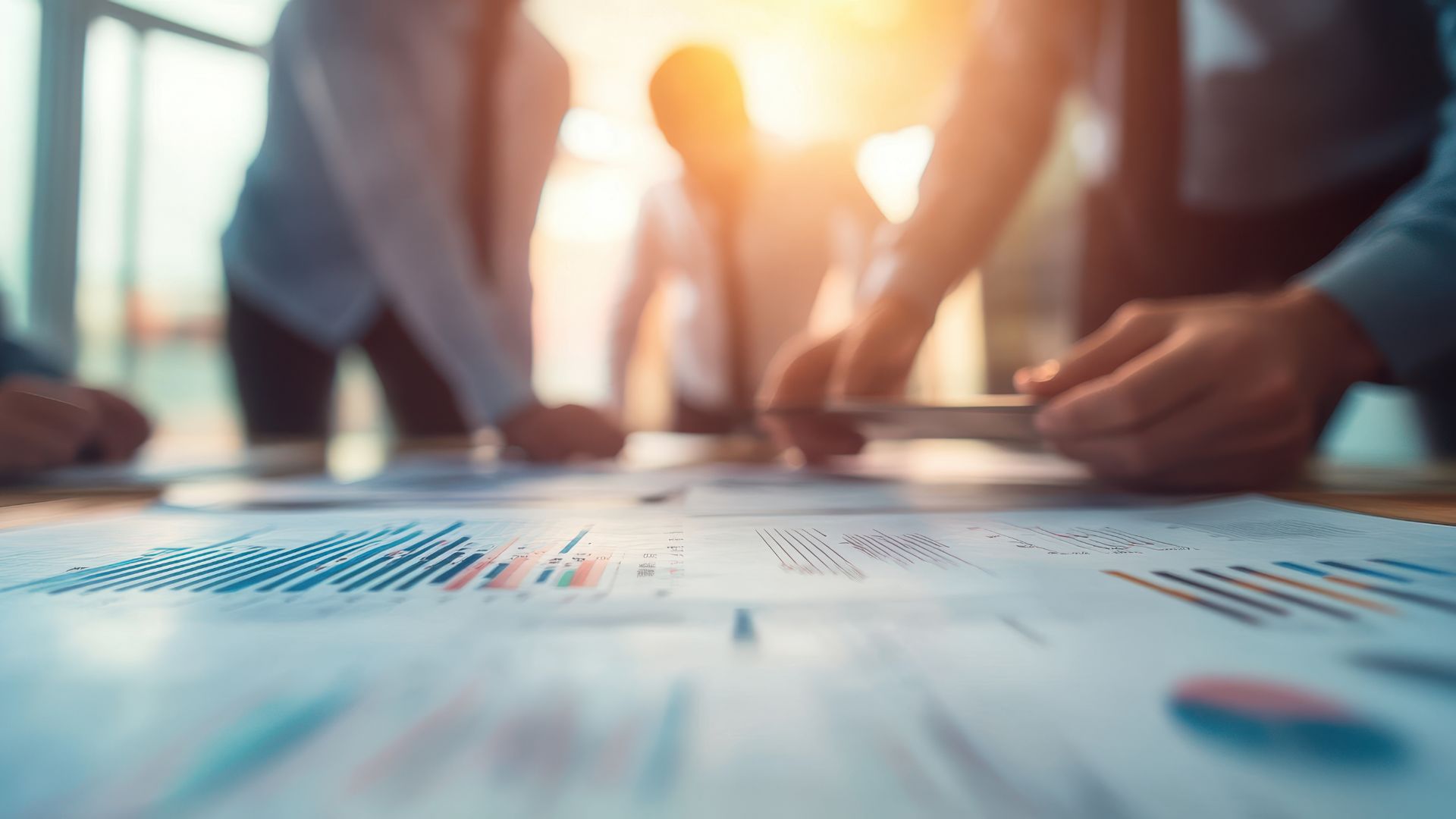 team reviewing goals and metrics in meeting