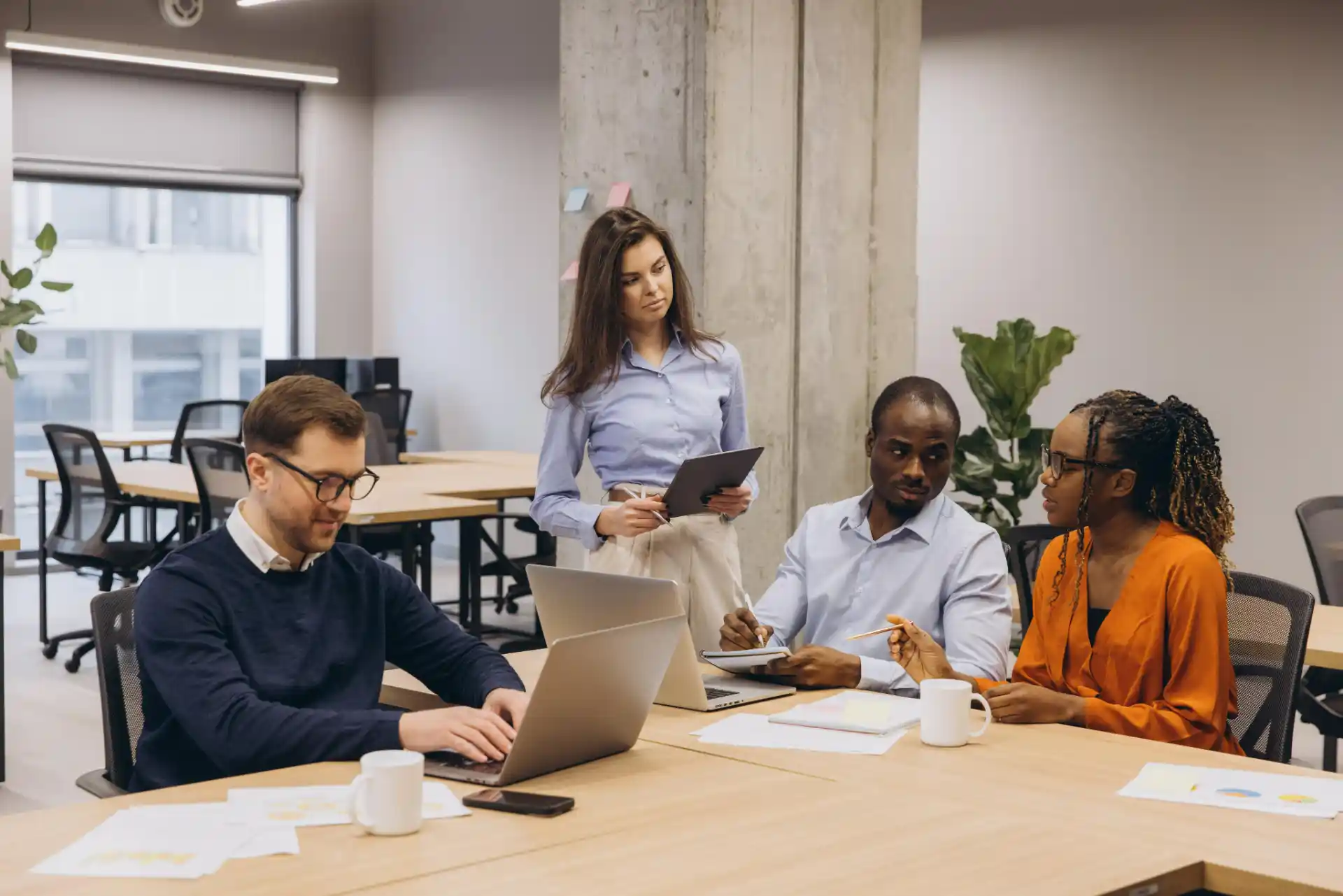 Multicultural colleagues working together Multicultural colleagues working together